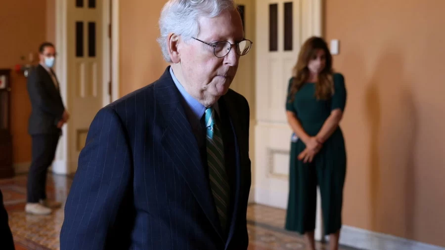 US Senate Republican Leader Mitch McConnell (R-KY) walks to his office after it was announced that the US Senate reached a deal to pass a $480 billion increase in Treasury Department borrowing authority, at the US Capitol in Washington, DC, October 7, 2021.