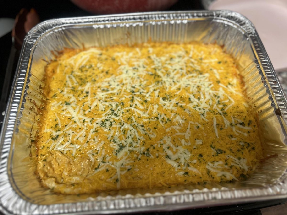 This buffalo chicken dip is a classic recipe with a little twist. | Armani Tyson